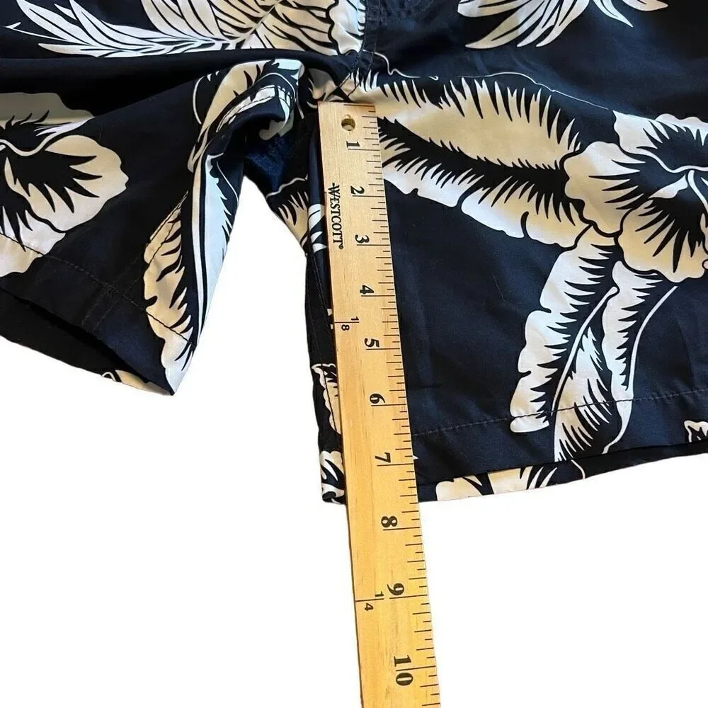 Hawaiian Print Swim Trunks. Navy and White. Size Small. Great Condition!!
